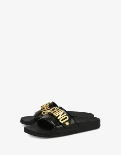 Moschino Sandals & Mules^Lettering Logo PVC pool slides BLACK