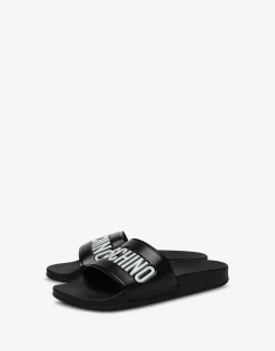 Moschino Sandals & Mules^PVC pool slides with logo BLACK